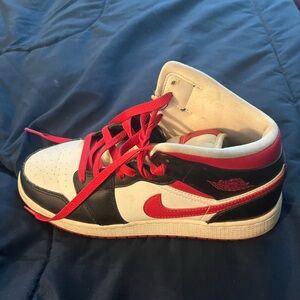 Nike Black and Red Sneakers with Classic Design